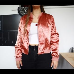 Pink silky jacket.